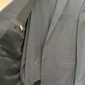 Kenneth Cole Blue two piece suit size 40 L and pants 34 w. Like new worn 5 times